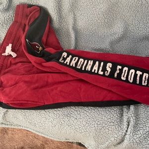 NFL Cardinals Football sweatpants. They are not open legged pants at the bottom.
